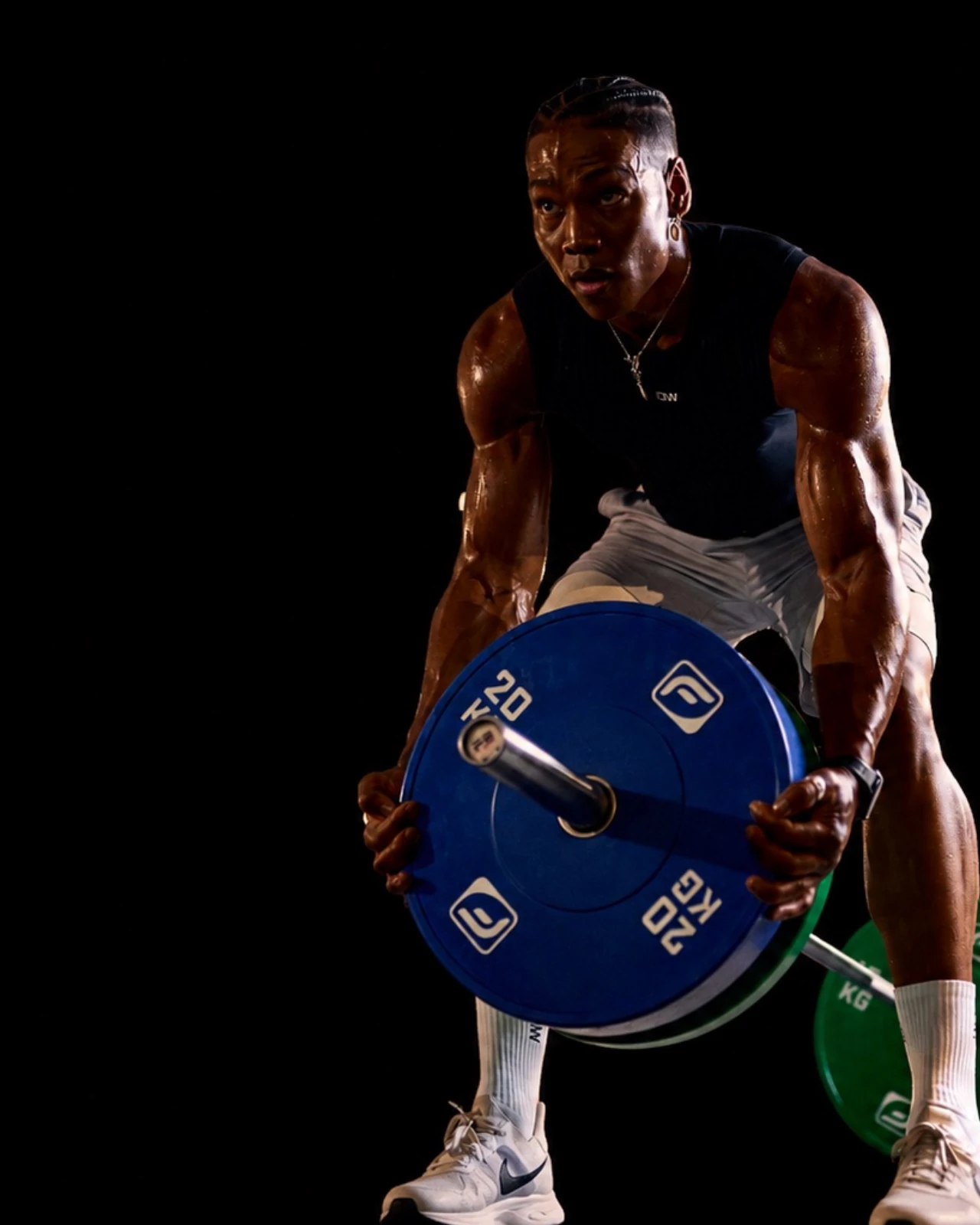 Fitness First Pro Athleten trainieren mit Kettlebells